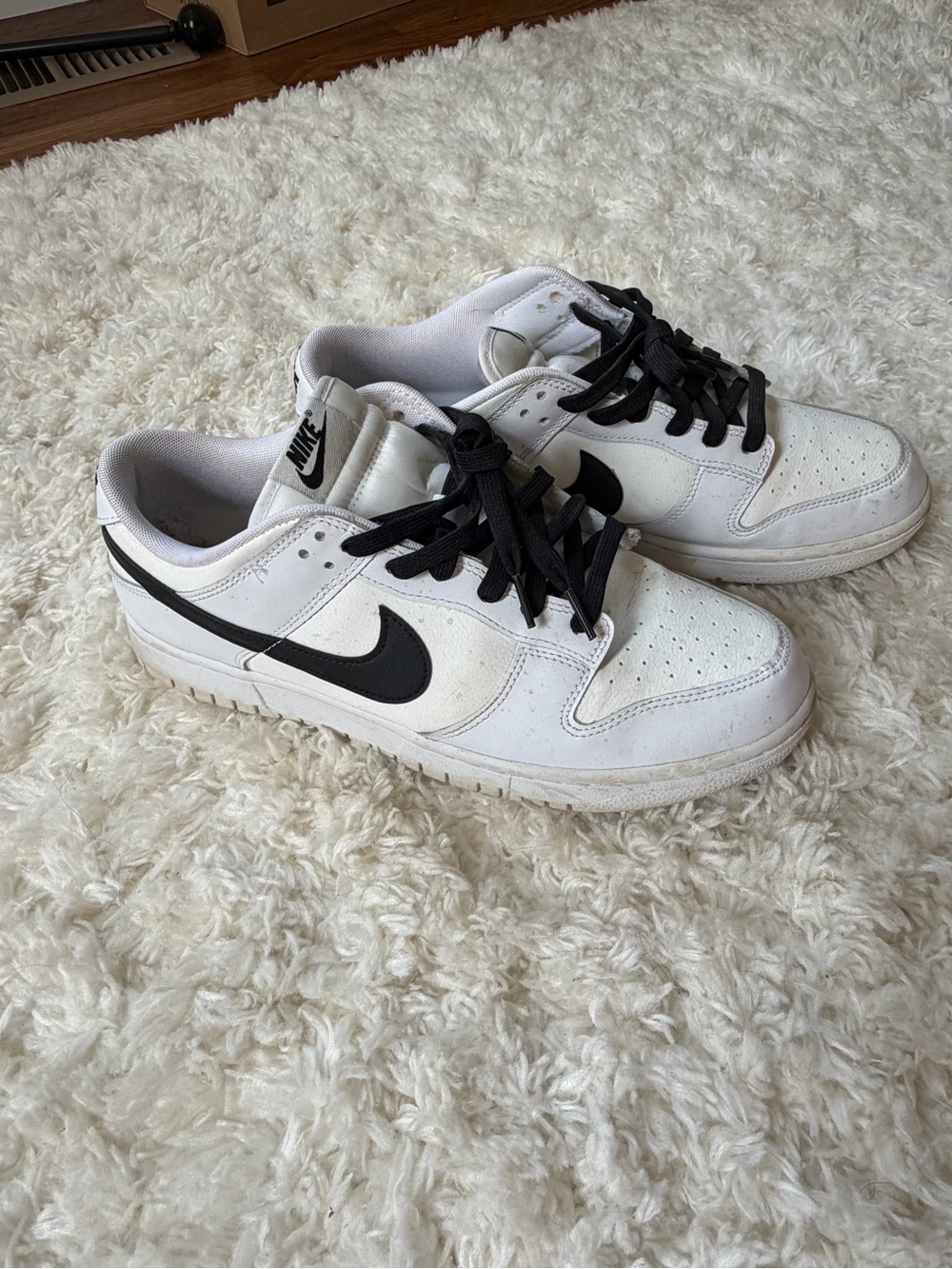Nike Men’s White and Black Low-Top Sneakers with Black Swoosh